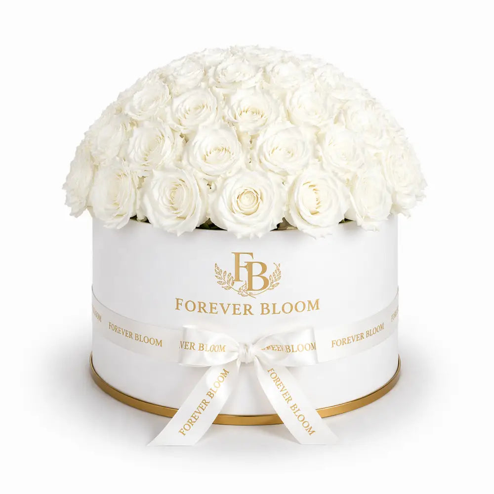 White flowers in a box with 'Forever Bloom' branding on a white background