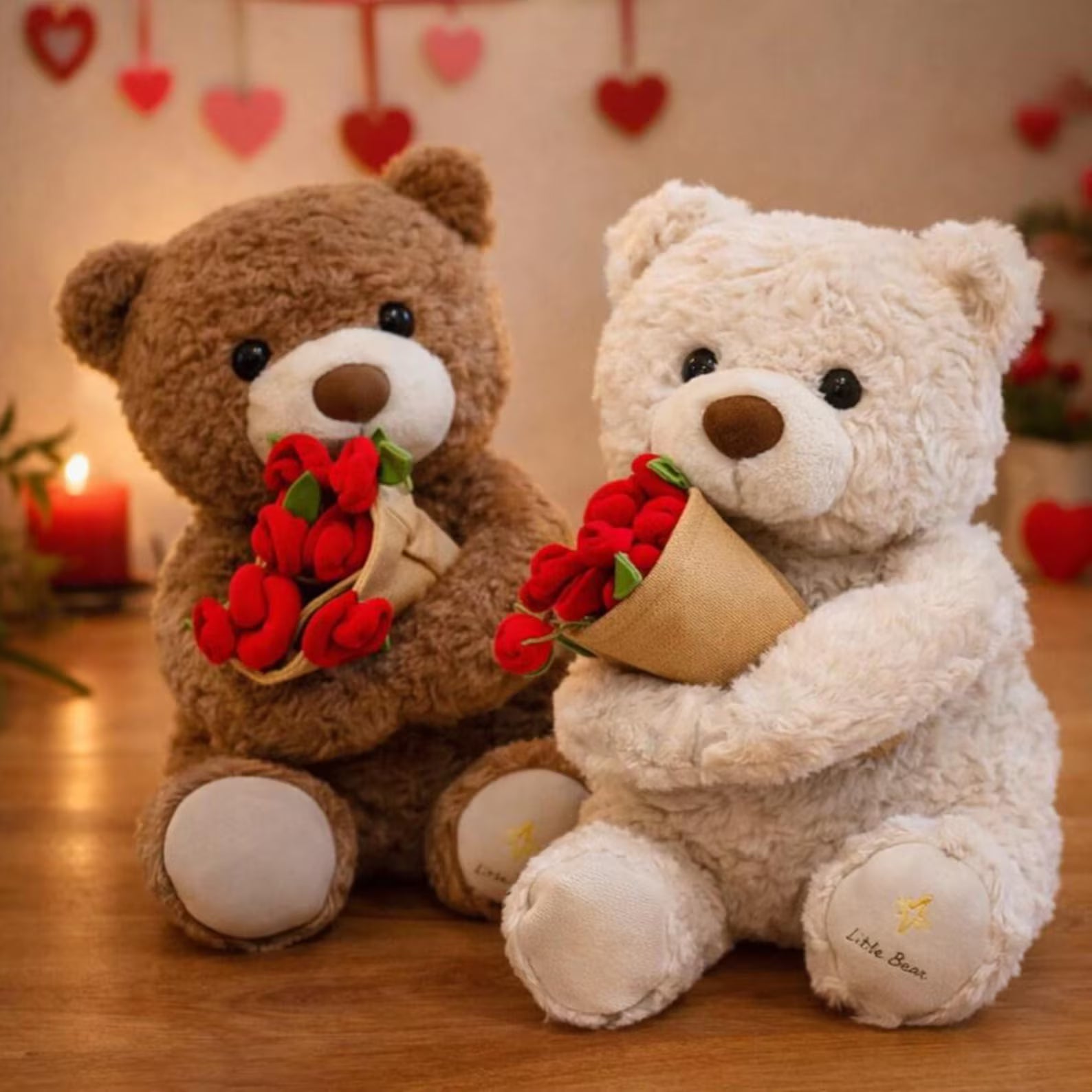 Two teddy bears, one brown and one white, holding red roses on a wooden surface with heart decorations in the background.