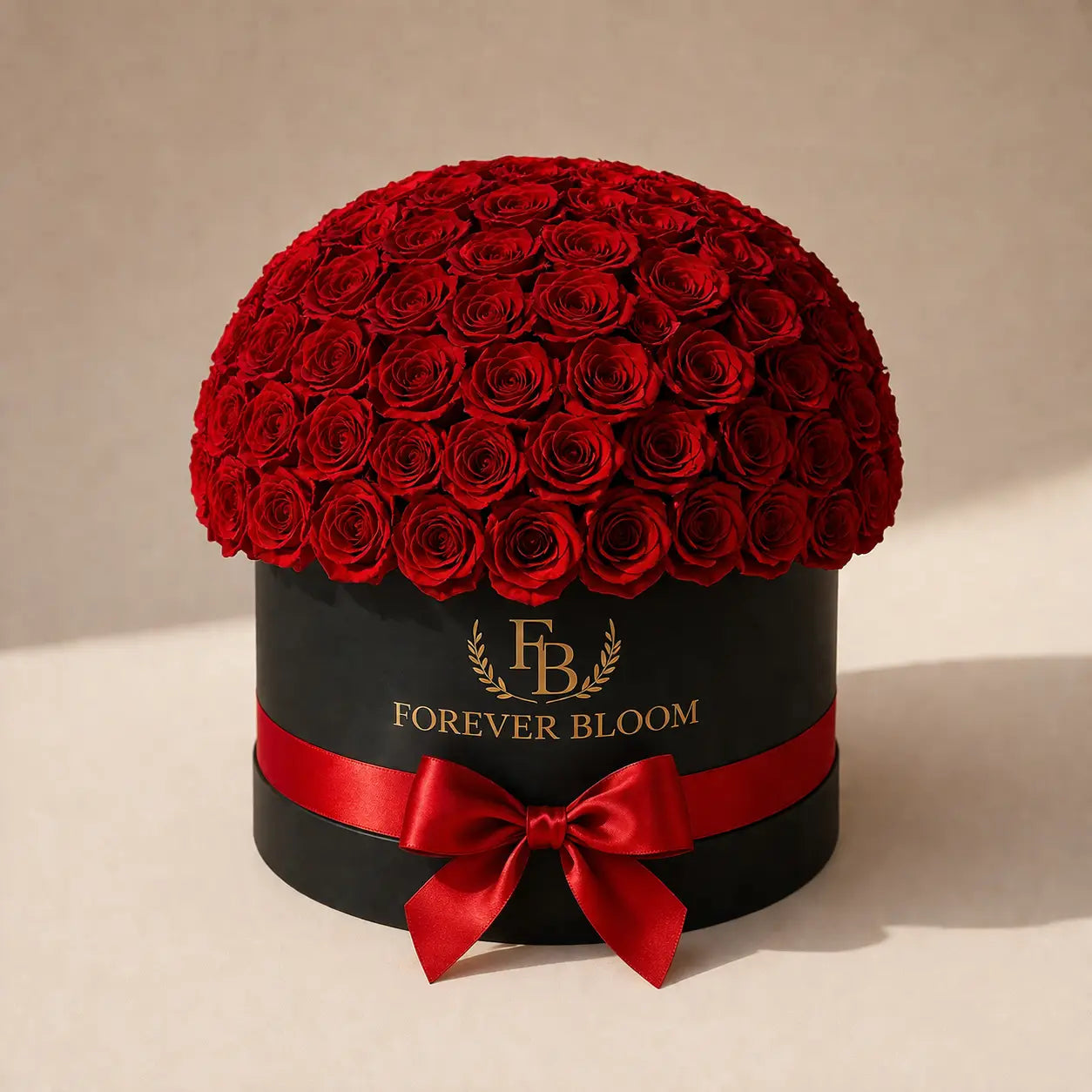 Black round box filled with red roses and a red ribbon, featuring 'Forever Bloom' branding.