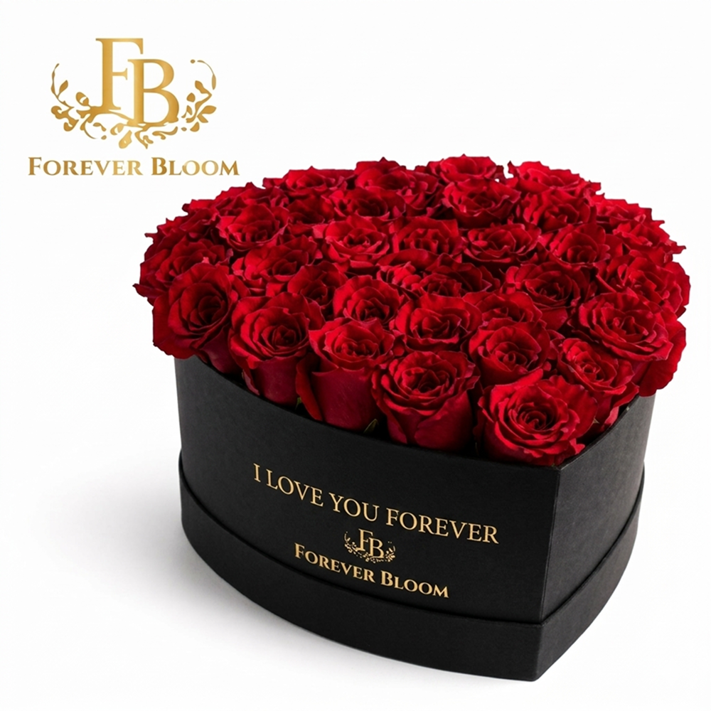 Heart-shaped box of red roses with 'I Love You Forever' text and Forever Bloom logo.